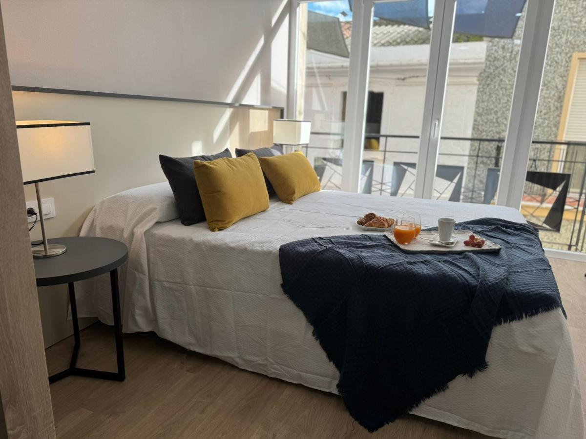 Apartamentos San Juan Suites باداخوز المظهر الخارجي الصورة